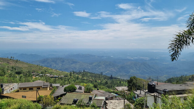 Hilly landscape of Sri Lanka dotted with villages and tea plantations near Haputale