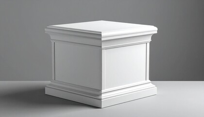 “White square pedestal with classical molding on gray background”