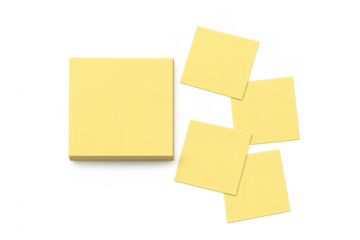 Yellow sticky notes stack and scattered reminders