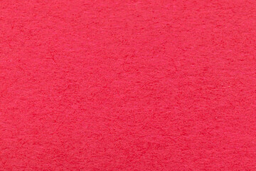 鮮やかな赤色の紙の表面