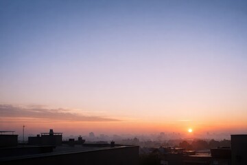 Sunrise Over Misty City Skyline From Rooftop