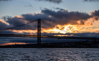 Lisbon's red bridge at sunset