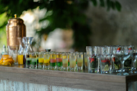 Charming outdoor bar featuring mixed drinks and citrus garnishes