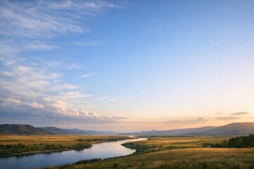 Fototapeta premium Scenic Winding River in a Golden Valley at Sunset