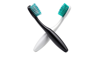 Two toothbrushes, black and white, crossed against a black background, bristles up
