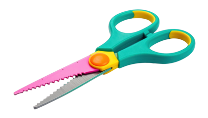 Open craft scissors with green handles, pink blade, and orange accent, isolated