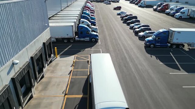 Commercial vehicle fleet lorry logistics parking area outdoor sunlight