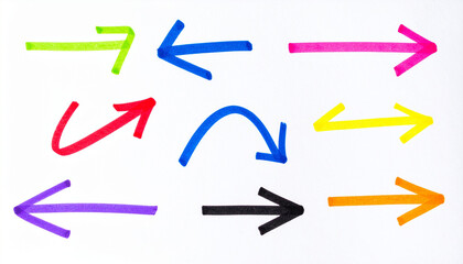Multicolored arrows pointing in various directions on a white background