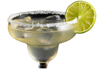 Margarita cocktail in a glass with salt rim and lime wedge garnish with ice and liquid visible on a transparent background PNG
