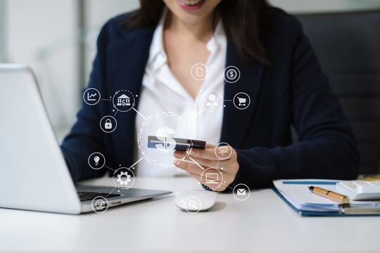 Woman using a credit card and digital laptop. - Powered by Adobe