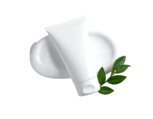 White cosmetic cream tube with green leaves on a white background.