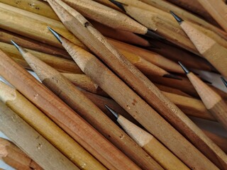 Collection of Wooden Pencils with Sharpened Tips.