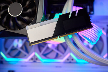 Elegant gaming hardware, High-performance RAM with cooling system, Premium illuminated memory...