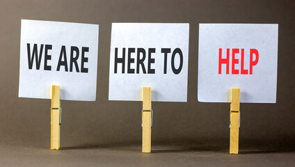 Support, help and we are here to help symbol. Concept words We are here to help on beautiful white...