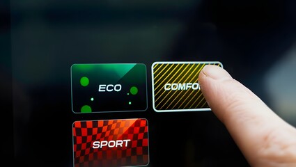Finger taps car touchscreen driving mode menu showing ECO COMFORT SPORT, offering choice between efficiency, comfort and sport.