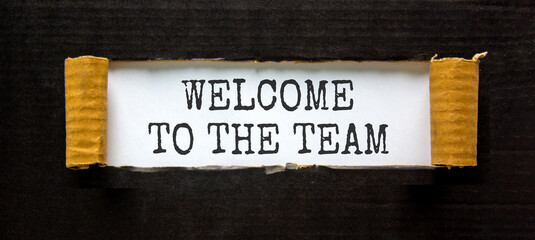 Support, help welcome to the team symbol. Concept words Welcome to the team on beautiful white paper. Beautiful black paper background. Business welcome to the team concept. Copy space.