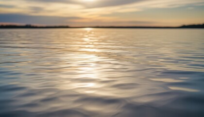 Golden Sunset Ripples on a Calm Lake