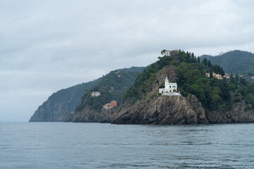Lighthouse Portofino on Rocky Cliff Above the Mediterranean Sea, Liguria