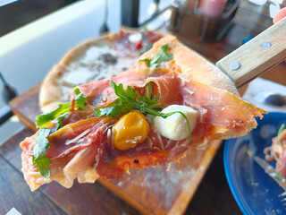 Close up of pizza sliced ​​pork, Cheese, tomatoes. Italian food
