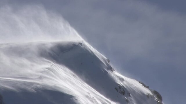snow drifting on a mountain