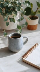 Top View of Blank Notebook and Coffee with Green Plants
