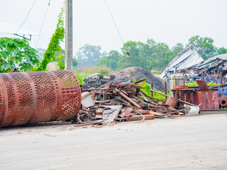 Gear scrap heap equipment metal machine in site factory industry. Rubbish pile steel, trash iron dump. Environment dirty. Machinery broken junk old aluminum. Industrial background construction. 