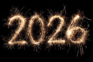 Happy new year 2026 text formed by bright sparklers on black background
