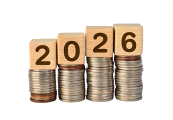 Year 2026 displayed on wooden blocks over graduated coin piles, isolated on a transparent background