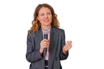 Professional woman giving a speech, holding a microphone while presenting during a conference with clear background