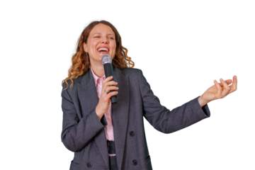 Woman presenter holding microphone, laughing brightly, engaging in public speaking and entertaining, transparent background