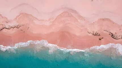 Fototapeta premium Aerial view of a serene beach with waves and pink sand - Beautiful pink beach background