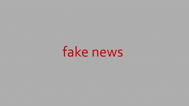 Words &ldquo;fake news&rdquo; being typed on a blank digital screen, representing misinformation, online deception, media distortion, and modern information risks. Motion graphics of fake news