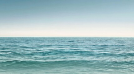 Obraz premium Vast water meets blue sky serene natural landscape view clear blue sky hangs over vast tranquil water surface