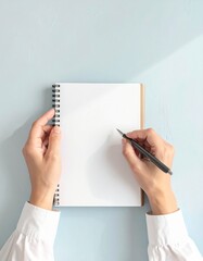 ペンを構える手元を捉えた縦型学習シーン 広い余白のある広告向け構図

書き始める直前の集中 ノートとペンの学習イメージ

学習の意思を表現するペンとノートの手元シーン 広告対応

清潔な机で描く学習準備の瞬間 ペンを構える手元構図