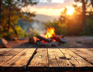 Wooden table foreground with a campfire and sunset background