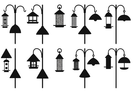 Dark Silhouettes of Bird Feeders and Lamps