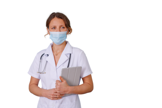 Female doctor or nurse wearing a face mask and white coat, holding a digital tablet, looking away on transparent background - Powered by Adobe