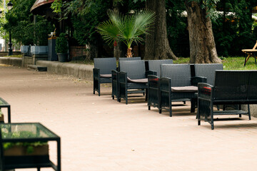 outside walking pavement alley way along patio restaurant space in tropic south region yard street urban square place