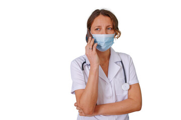 Female medical professional wearing face mask and stethoscope, talking on a smartphone, on transparent background