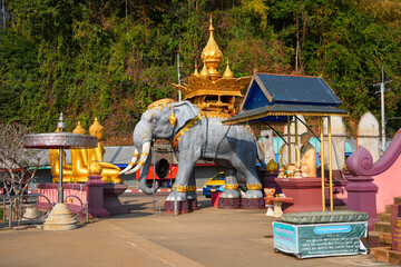 Ceremonial elephant statues in the Golden Triangle Park (Sop Ruak) on the banks of the Mekong River in Chiang Saen in Northern Thailand at the triple border between Myanmar, Laos and Thailand