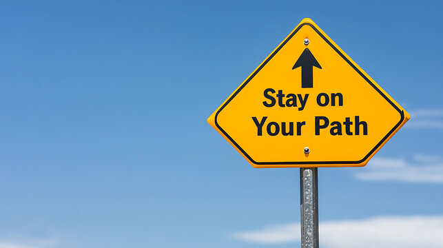 Motivation to keep going. A sign directs viewers to "Stay on Your Path" to encourage them to preserve and not be discouraged on a blue sky background with no clouds.