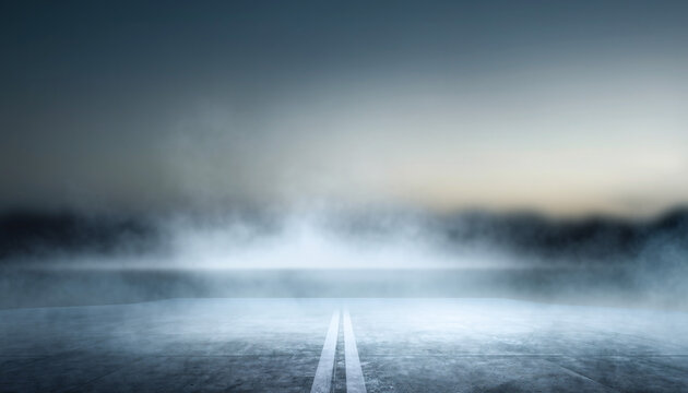 Dramatic long shot of an empty asphalt road disappearing into thick, swirling fog under a subdued sky, creating an atmospheric and mysterious scene of travel and unknown destiny
