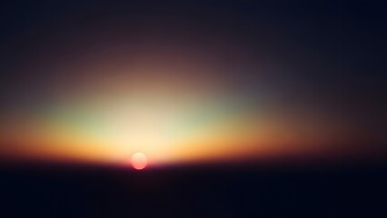 Beautiful sunset and sunrise glow over mountain peaks under a bright orange and red sky with summer clouds at dusk