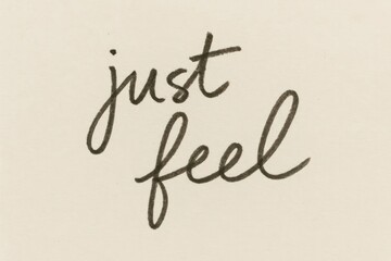 A handwritten phrase 'just feel' in elegant script on a textured beige background. The design conveys a sense of calm and introspection.