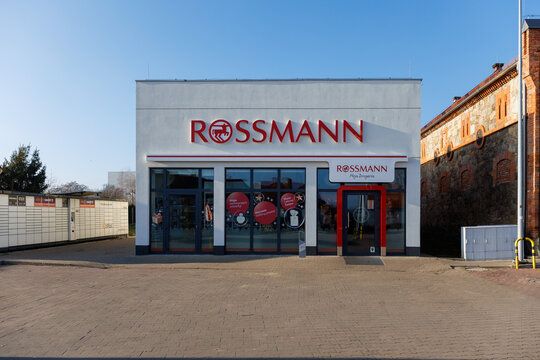 Zarow, Poland &ndash; December 26, 2025: Front view of a Rossmann drugstore with large logo and glass windows in a small town setting
