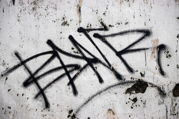 Black Graffiti Lines on Weathered White Concrete Wall Texture