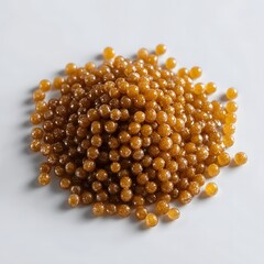 Shiny silver caviar piled and scattered on white background