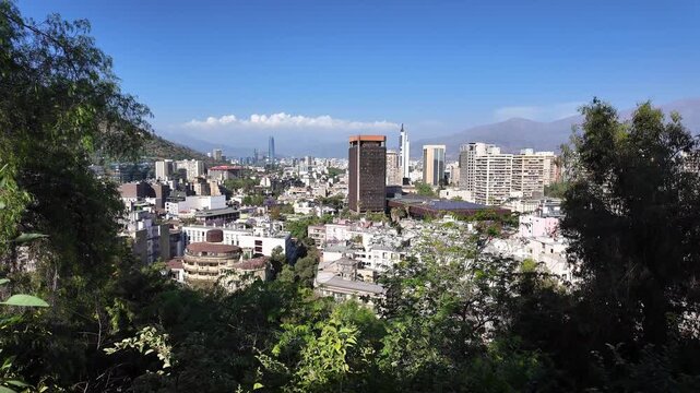 Santiago, Chile: Panoramic footage of Santiago skyscraper, the capital city of Chile, taken from Santa Lucia HIll on sunny day with mountain in the background