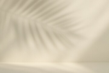 Obraz premium Warm Neutral Background with Large Palm Leaf Shadow and Soft Sunlight