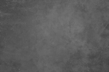 High-resolution dark gray concrete texture with rough stone surface, ideal for industrial backgrounds, modern design, construction themes, and abstract wall backdrops.